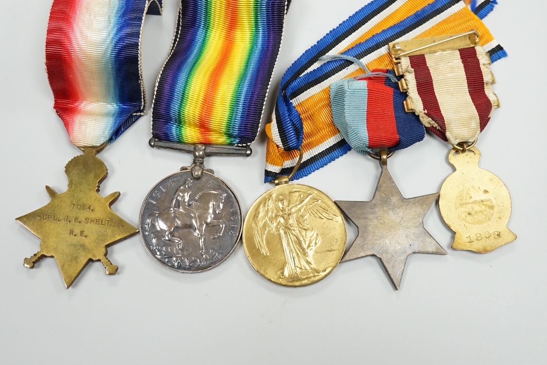 A First World War medal trio to Crl. J.E. Shelton R.E., together with a WWII 1939 to 1945 star, a British Red Cross long service medal, plus a few mainly Far Eastern and Indian coins, etc.